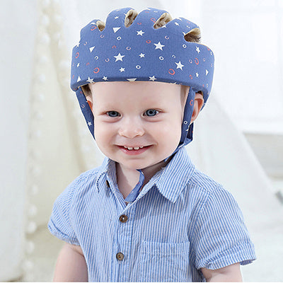 Baby safety helmet – lightweight shock-absorbing head protector with DuPont filling, breathable fabric, and adjustable strap for toddlers learning to walk  
