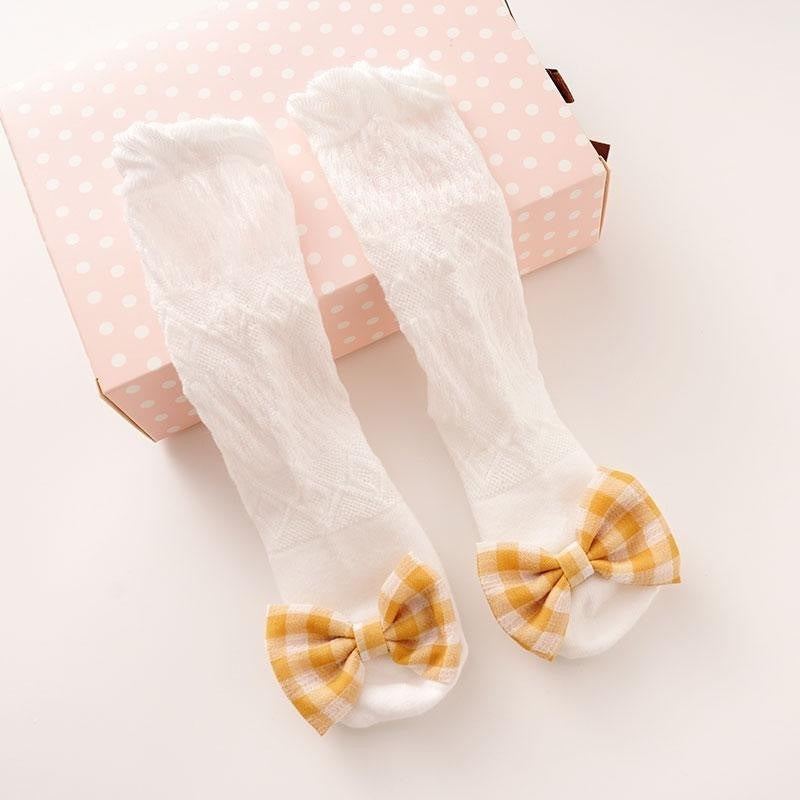 baby socks with yellow bow detail