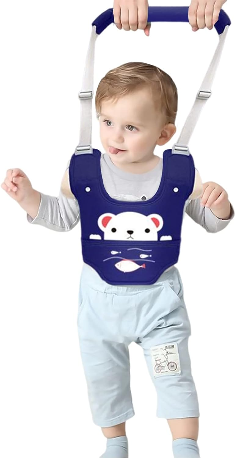 baby wearing walking harness while practicing standing
