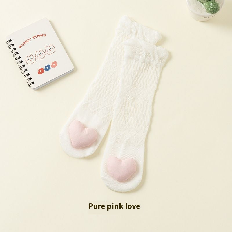 light pink baby socks with bow accent